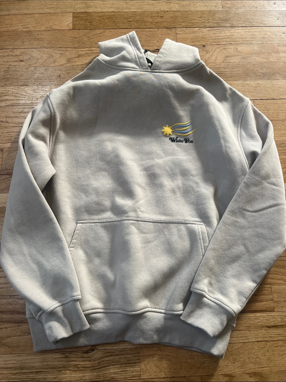 White Fox Boutique Cream Pullover Hoodie with Sun Embroidery